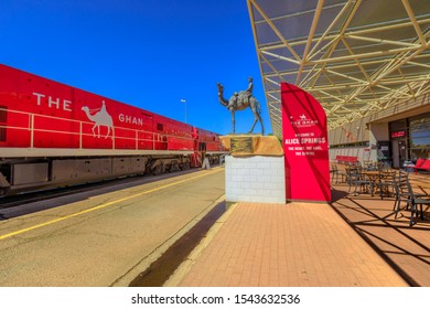 Alice Springs, Northern Territory, Australia - Aug 29, 2019: The Ghan Memorial: Statue Of Afghan Worker And Camel And Arrival Of Legendary Train The Ghan In Alice Springs Train Station.