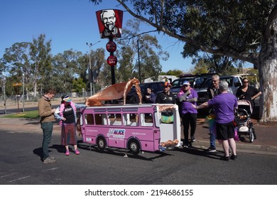 Alice Springs, Northern Territory, Australia, August 20, 2022. People With Homemade Bus-Shaped Boat Waiting To Join A Street Parade