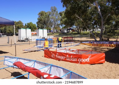 Alice Springs, Northern Territory, Australia, August 19, 2022. Two People Assembling Dinghies A Day Prior To The Henley-on-Todd Regatta