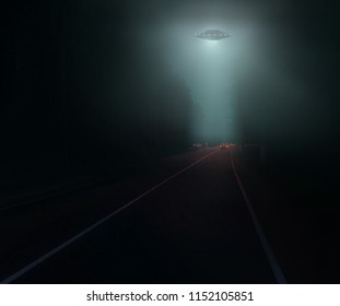 Alien abduction at the country road. UFO flying saucer with light above cars.Car headlights in the dark pine wood at night. misty road/dar highway with red lights. Driving through spooky forest.