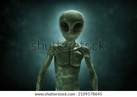 Alien creature on dark background