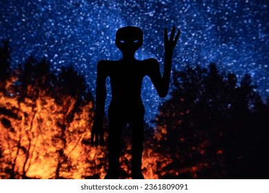 “The Alien from Nazca”. My art about world’s first official event on extraterrestrial life. Mexican alien from Nazca, Peru. The alien silhouette on the starry night background.