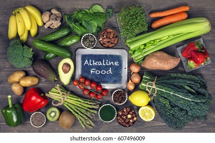 Alkaline foods above the wooden background