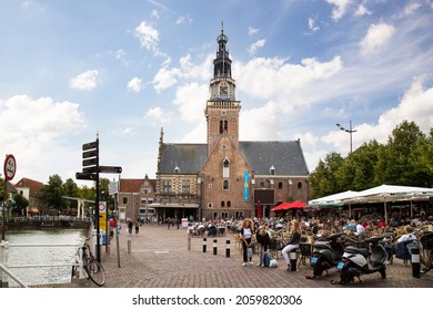 Alkmaar, The Netherlands, August 14, 2019; Young people enjoy the square at the weigh house in the center of Alkmaar.