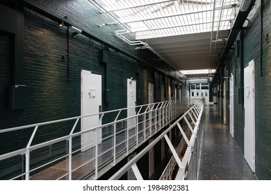 Alkmaar, The Netherlands-June 2021; Side View View Into Upper Hallway With Prison Cells Of Former Prison Now Renovated Boutique The Fallon Hotel Retaining The Original Interior Features