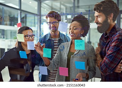 Its all about strategic planning. Cropped shot of coworkers brainstorming in a modern office. - Shutterstock ID 2151163043
