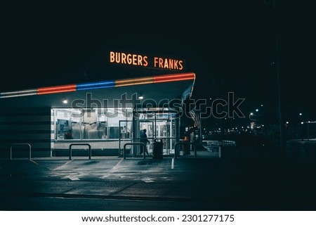 All American Hamburger Drive In neon sign at night, Massapequa, New York