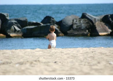 All by myself.... a toddler wanders at the beach