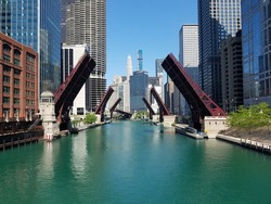 All Chicago River Drawbridges Raised Elevated At The Same Time Under A Clear Blue Sky In Summer