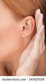 I Am All Ears! Close-up Of Women's Ear Listening To The Gossip