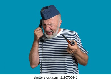 All Hands On Deck. Old Sailor Orders On The Phone. Call Out	