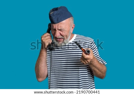 All hands on deck. Old sailor orders on the phone. Call out	