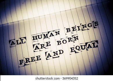 all human beings are born free and equal text on paper in retro style
