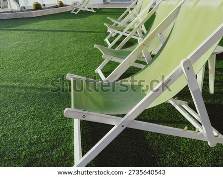 All Inclusive Vacation Concept with Empty Deck Chairs