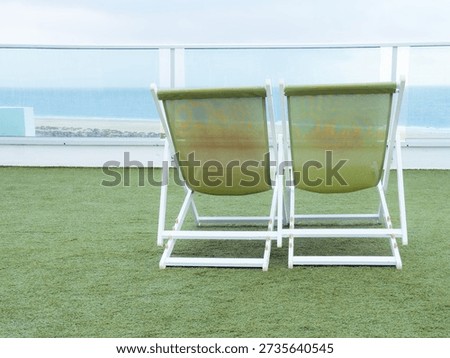 All Inclusive Vacation Concept with Empty Deck Chairs