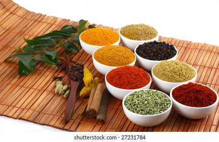 All kinds of dry spicy powders on mat background