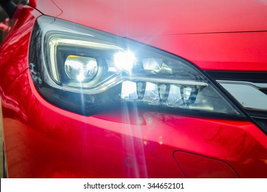 All LED adaptive headlight of a modern car. Headlight consists of 16 individual matrix LED units that can be switched on, off or dimmed, depending on driving conditions.