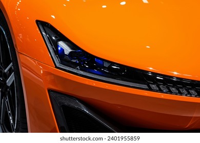 All LED adaptive headlights of a modern car. Headlight consists of individual matrix LED units that can be switched on, off, or dimmed, depending on driving conditions