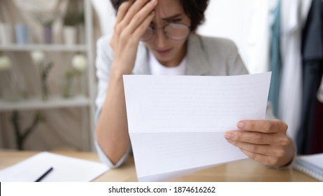 All Is Lost. Frustrated Millennial Businesswoman Receiving Bad News Of Bankruptcy Losing Business In Formal Paper Letter By Mail. Depressed Freelancer Remote Worker Reading Notice Of Fraud Dismissal