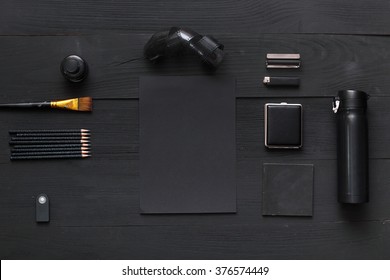 All Object Is Black On Wooden Table. Black Table Top View Of The Artist. Empty Wooden Bench For Creative Work. Top View Office Workplace. Background For Post In Blog. 