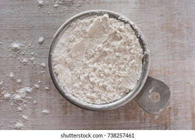 All Purpose Baking Flour In A Measuring Cup