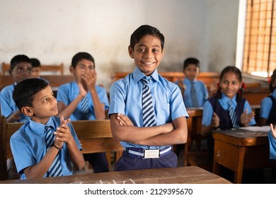 All Students Clapping For Intelligent Or Brilliant Kid At Classroom For Achievement - Concept Of Encouragement, Proud, Motivational And Inspiration