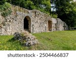 All that remains of the old Augustine priory in the village of Southwick in Hampshire UK. View looking along the full length of the remaining wall.