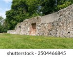 All that remains of the old Augustine priory in the village of Southwick in Hampshire UK. View looking along the full length of the remaining wall.