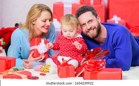 All Thoughts About Love. Love And Trust In Family. Bearded Man And Woman With Little Girl. Valentines Day. Boxing Day. Father, Mother And Doughter Child. Happy Family With Present Box.