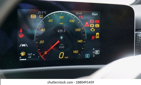 All warning lights are illuminated on the digital driver's display screen on a modern car
