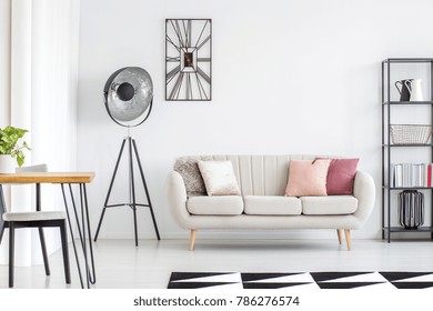 All White Room With Grey Sofa, Metal Furniture And Black And White Carpet