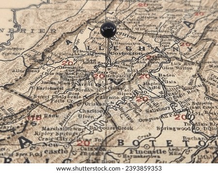 Alleghany County, Virginia vintage map marked by a black tack. The county seat is in Covington, VA.