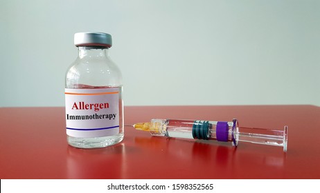 Allergen Immunotherapy In Bottle And Syringe For Injection. Allergy Shot Or Desensitization Is Treatment For Allergy As Allergic Rhinitis Disease. Medical Immunology And Research Technology Concept.