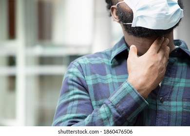 Allergic Sick Black African Man Coughing With Sore Throat; Concept Of African Man With Allergy, Pneumonia, Sore Throat, Influenza, Flu, Cold, COVID-19 Coronavirus, Social Distancing Concept
