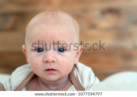 Similar – Cute baby in hands of crop anonymous father