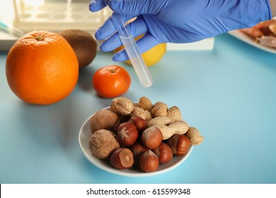 Allergy Food Concept. Hand In Glove Holding Test Tube With Sample