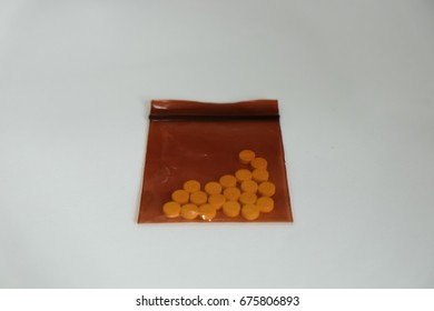 Allergy Pill In Opaque Bag On White Background