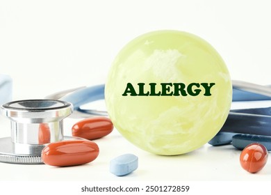 Allergy text written on a balloon in a composition with a stethoscope, pills and vitamins on a white background - Powered by Shutterstock