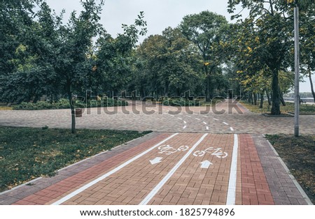 Similar – Image, Stock Photo White bike path sign