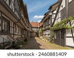 Alley with cobblestones and half-timbered houses in the historic old town of Gengenbach, Kinzigtal, Black Forest, Baden-Wuerttemberg, Germany