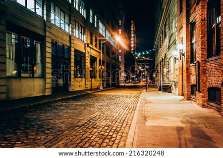 An alley at night, in Brooklyn, New York.