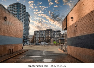 Alley way with brick wall. Urban Exploration Eyelevel Perspective. Cityscape in White rock Canada. urban background of a brick wall. Travel photo, nobody, copy space for text. January 10,2023 - Powered by Shutterstock