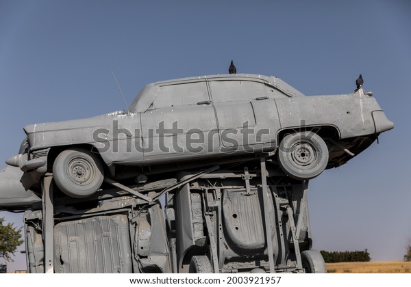 Alliance, NE, USA 06-06-21 Carhenge: wrecked\
cars have been arranged like England\'s Stonehenge at this public\
art installation