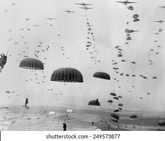 Allied aircraft drop paratroopers into German held Netherlands, for Operation Market Garden. The plan to capture key bridges in Netherlands failed with 15,000 Allied casualties. - Shutterstock ID 249573877