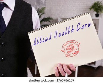 Allied Health Care sign on the piece of paper. - Shutterstock ID 1765786139