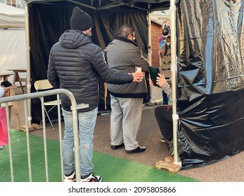 Allier, France - 23 Dec 2021 - People Show Their Vaccine Certificate Or Health Pass To Enter The Christmas Fair In The City. 