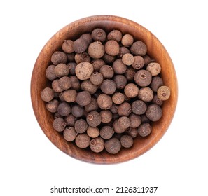 Allspice In Wooden Bowl, Isolated On White Background. Jamaican Pepper, Pimento Berry, Allspice Peppercorns Or Myrtle Pepper. Top View