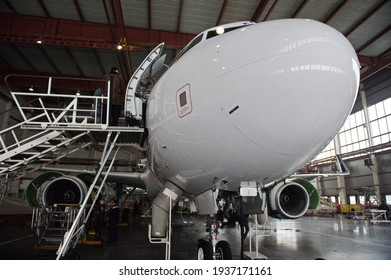 Almaty, Kazakhstan - 01.29.2014 : Air Astana Airbus A320 plane in hangar during repair