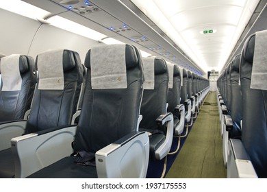 Almaty, Kazakhstan - 01.29.2014 : The Passage Between The Seats In The Cabin Of The Airbus A320 Aircraft Of The Air Astana Airline