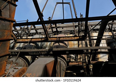 Almaty, Kazakhstan - 02.04.2021 : Metal structure connecting several pipes to the heating plant - Shutterstock ID 1910119624
